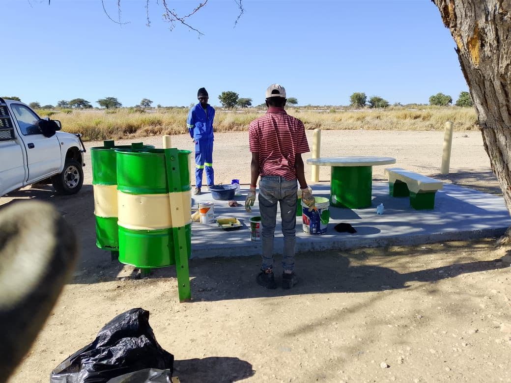 A crew beside roadside infrastructure work