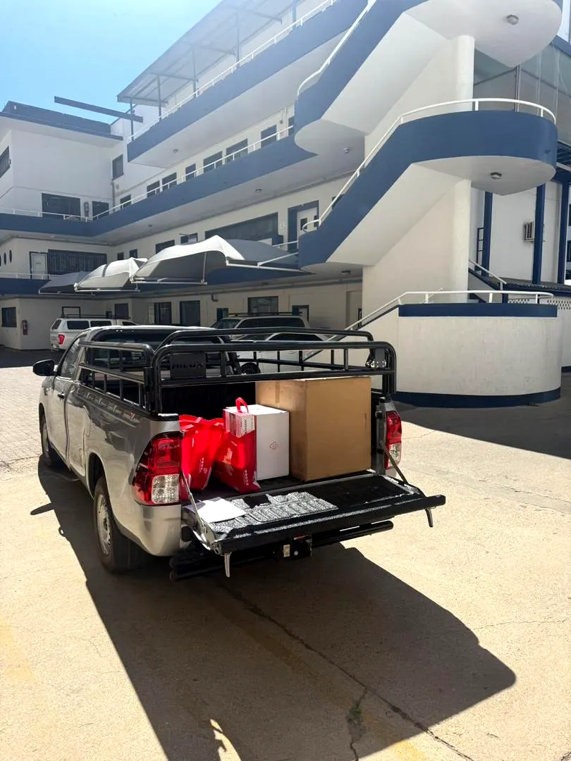 Loaded bakkie delivering supplies at an institutional building